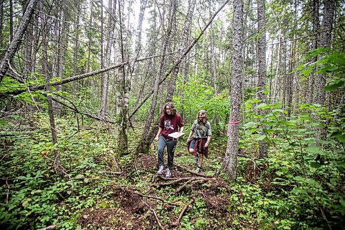 MIKAELA MACKENZIE / WINNIPEG FREE PRESS

Lockport School grade nine students Kasey Forman (left) and Sam Caslake walk the trail at the grand opening of Lord Selkirk School Division&#x573; Albert Beach Trail field trip site on Thursday, Sept. 19, 2024.

For Maggie story.
Winnipeg Free Press 2024