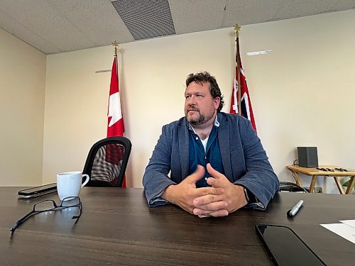 Brandon East NDP MLA and Sport, Culture, Heritage and Tourism Minister Glen Simard listens to a question from Brandon Sun reporter Colin Slark during an interview at Simard's 10th Street constituency office on Friday morning. (Matt Goerzen/The Brandon Sun)