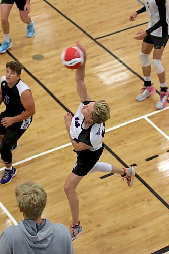 Vincent Massey sophomore Ty Cowan attacks during the Brandon University varsity boys' volleyball tournament at the HLC on Friday. (Thomas Friesen/The Brandon Sun) 