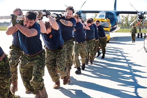 Ruth Bonneville / Free Press

Standup  -  Plane Pull

Photo of 17 Wing CE - Eager Beaver team as they participate in the plane pull event Friday.  

give it all they have as they pull an Airbus CC-330 Husky plane along the 17 Wing tarmac during the Plane Pull Friday. 


17 Wing Winnipeg hosts GCWCC Plane Pull Friday featuring 21 teams with 25 people in each team.  
        
The GCWCC Plane Pull is a charitable event held in support of United Way Winnipeg, where representatives from United Way, members of 17 Wing Winnipeg, and teams from the local community compete in timed pulls of military aircraft and equipment.


Sept 20th,  2024L