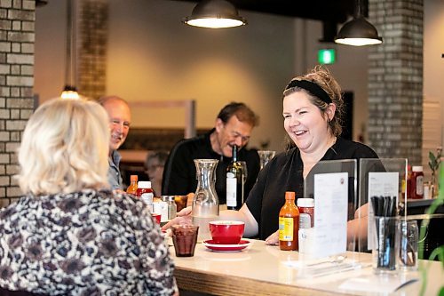 MIKAELA MACKENZIE / WINNIPEG FREE PRESS

Pam Holunga, owner, chats with customers at the Roasted Nomad on Friday, Sept. 20, 2024. 

For Eva story.
Winnipeg Free Press 2024