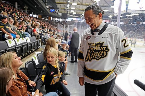 20092024
Manitoba Premier Wab Kinew meets fans after taking part in the ceremonial puck-drop at the Brandon Wheat Kings WHL home-opener against the Moose Jaw Warriors at Westoba Place on Friday evening. 
(Tim Smith/The Brandon Sun)