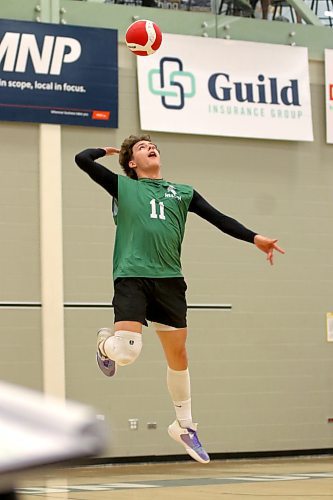 Neelin Spartans Lucas Gamache serves during the Brandon University varsity boys' volleyball tournament final against the Dauphin Clippers at the HLC on Saturday. (Thomas Friesen/The Brandon Sun)