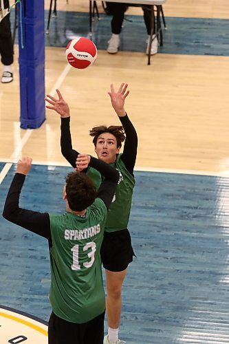 Neelin Spartans Junior Martine sets a ball during the Brandon University varsity boys' volleyball tournament final against the Dauphin Clippers at the HLC on Saturday. (Thomas Friesen/The Brandon Sun)