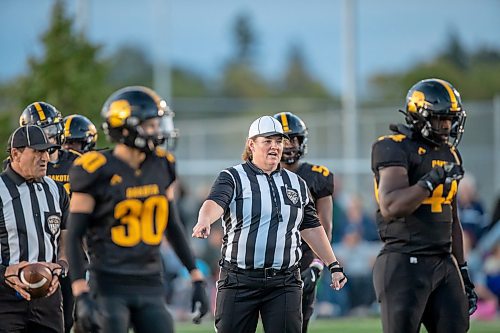 BROOK JONES / FREE PRESS
The Dakota Lancers host the visiting Grant Park Pirates in AAAA South East Winnipeg High School Football League action at Dakota Collegiate in Winnipeg, Man., Thursday, Sept. 19, 2024. Pictured: Lori Turksi (middle) is a female head referee in the WHFL and a member of the Manitoba Football Officials Association.