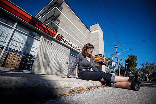 JOHN WOODS / FREE PRESS
Michelle Dore, a resident of the Sherbrook Inn, is photographed outside the hotel Sunday, September 22, 2024. Dore and other residents are being evicted from the hotel by the new owner.

Reporter: malak