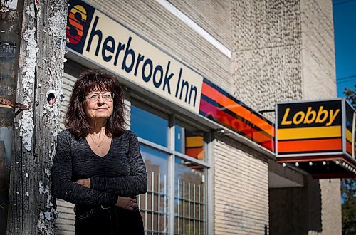 JOHN WOODS / FREE PRESS
Michelle Dore, a resident of the Sherbrook Inn, is photographed outside the hotel Sunday, September 22, 2024. Dore and other residents are being evicted from the hotel by the new owner.

Reporter: malak