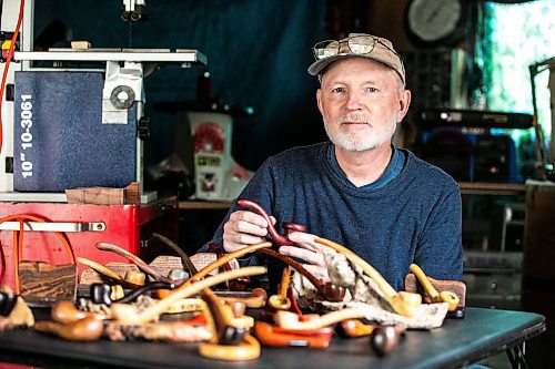 MIKAELA MACKENZIE / WINNIPEG FREE PRESS
	
Jeff Nelson, who makes wooden pipes for pot smokers, with finished pipes in his garage workshop on Monday, Sept. 23, 2024. 

For AV story.
Winnipeg Free Press 2024