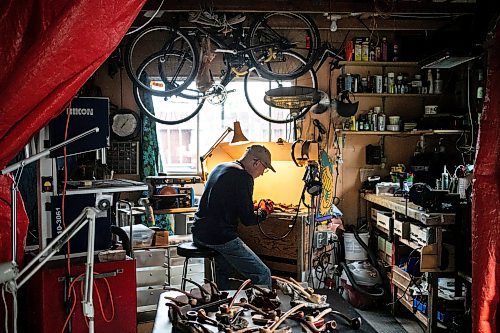 MIKAELA MACKENZIE / WINNIPEG FREE PRESS
	
Jeff Nelson, who makes wooden pipes for pot smokers, works in his garage workshop on Monday, Sept. 23, 2024. 

For AV story.
Winnipeg Free Press 2024