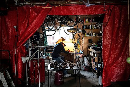 MIKAELA MACKENZIE / WINNIPEG FREE PRESS
	
Jeff Nelson, who makes wooden pipes for pot smokers, works in his garage workshop on Monday, Sept. 23, 2024. 

For AV story.
Winnipeg Free Press 2024