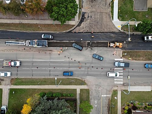 23092024
Paving work continues on 18th Street at Louise Avenue in Brandon on Monday. 
(Tim Smith/The Brandon Sun)