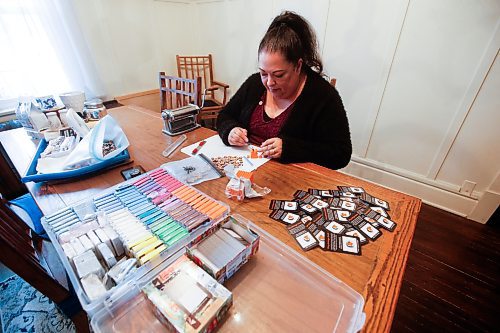 JOHN WOODS / FREE PRESS
Christine Brouzes, an artist who makes clay pins by hand to mark Orange Shirt Day, creates some her tiny creations in her home Monday, September 23, 2024. 

Reporter: malak