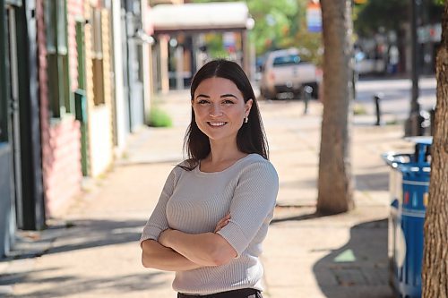 Brandon Chamber of Commerce new general manager Olivia Boyce pose for a picture in front of the chamber on Tuesday morning. (Abiola Odutola/The Brandon Sun) 