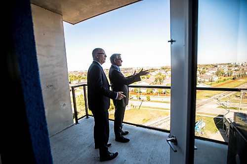 MIKAELA MACKENZIE / WINNIPEG FREE PRESS
	
Globe Capital Management president and CEO Richard Morantz (right) shows mayor Scott Gillingham The Bolt, a luxury apartment block on Pembina, on Tuesday, Sept. 24, 2024. 

For Aaron Epp story.
Winnipeg Free Press 2024