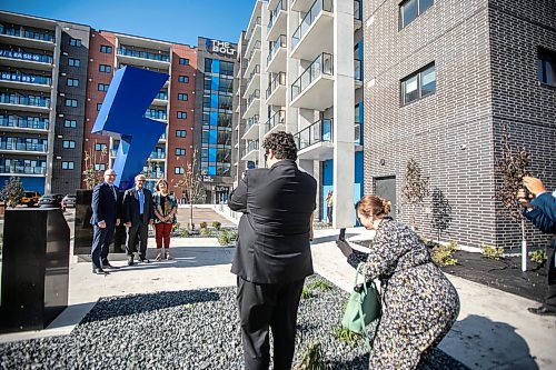 MIKAELA MACKENZIE / WINNIPEG FREE PRESS
	
Mayor Scott Gillingham (left), Globe Capital Management president and CEO Richard Morantz, and councillor Janice Lukes take a photo in front of The Bolt, a luxury apartment block on Pembina, on Tuesday, Sept. 24, 2024. 

For Aaron Epp story.
Winnipeg Free Press 2024