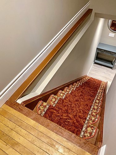 Marc LaBossiere / Winnipeg Free Press

The completed stairway leading to the basement marks the completion of the entire basement renovation