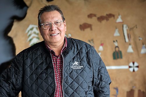 Sioux Valley Dakota Nation Chief Vince Tacan, seen here standing in a boardroom at the community band office on Sept. 16, says Manitoba Premier Wab Kinew has offered several Dakota First Nations a share of provincial gaming revenue if they commit to ending any pursuit of building a casino in Manitoba. Two other chiefs back up his claim. (Matt Goerzen/The Brandon Sun)