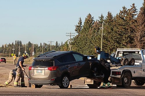 Emergency services members work at the scene of a collision at the intersection of the Trans-Canada Highway and Highway 5, just north of Carberry, late Wednesday afternoon. At least two vehicles were involved in the collision. No details were provided by RCMP on scene. (Tim Smith/The Brandon Sun)