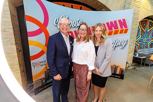 MIKE DEAL / FREE PRESS
Winnipeg Mayor Scott Gillingham, Kate Fenske CEO of Downtown Winnipeg BIZ, and Amelia Laidlaw chair of Downtown Winnipeg BIZ during the launch of the BIZ&#x2019;s new marketing campaign at The Forks Wednesday morning. 
Reporter: Gabrielle Piche 
240925 - Wednesday, September 25, 2024.