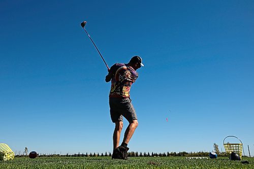 25092024
Derek Smart hits ball along with friends at Mulligan's Driving Range &amp; Practice Centre along Highway 1A just outside Brandon on a beautiful late September Wednesday.
(Tim Smith/The Brandon Sun)