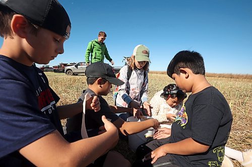 05092024
Hamiota Elementary School grade 4-5 studentslearn about canola during the fourth annual Acres for Hamiota community harvest west of Hamiota on a sunny Tuesday. Acres for Hamiota raises money for community projects and organizations and this year all the machinery for the harvest was operated by women to highlight the important role women play in agriculture. The harvest was preceded by a picnic lunch.
Tim Smith/The Brandon Sun) 