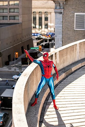 MIKAELA MACKENZIE / FREE PRESS 
Josh Pchajek, 22, who bills himself as Winnipeg Webhead, has been donning a variety of Spider-Man costumes for events all over the city in the last three years.