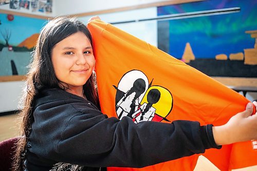 MIKAELA MACKENZIE / WINNIPEG FREE PRESS

Breanna Mink (16), who designed the orange shirt day t-shirts that Rossbrook House is selling to raise funds, at the inner-city drop-in centre on Thursday, Sept. 12, 2024. The unique design features the colours of the four directions and was created by a talented teenaged artist who has been a Rossbrook House participant for several years. Breanna is also one of the Junior Staff, a program that employs participants as young as 13 years of age.

Standup.
Winnipeg Free Press 2024