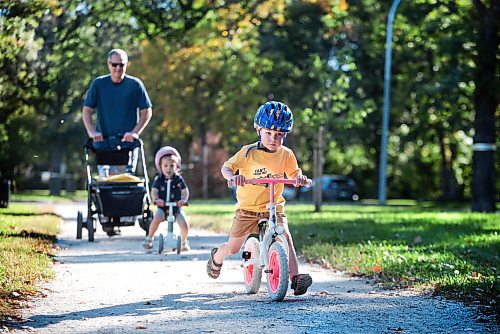 Ruth Bonneville / Free Press

Weather standup - Can't catch me.  

Theo Hildebrand, who turns 4 next month, races ahead of his little sister  Lucy-  2yrs and his granddad while out for a summer-like jaunt on his slider bike in River Heights Thursday. His t-shirt precisely describes his young, energetic spirit - Can't catch me. 


Sept 26th,  2024