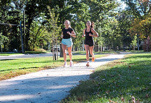 Ruth Bonneville / Free Press

Weather standup - joggers  

Camryn Watson (left - blue shorts) and her friend Tia Davidson decided to take advantage of the beautiful, summer-like weather and go for a 5km run from Assiniboine Park along the Crescent Thursday. 

Sept 26th,  2024