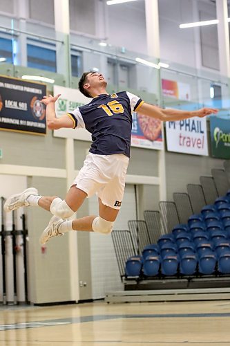 Brandon University Bobcats outside hitter Ryden Hargreaves serves during BU's home tournament against the Winnipeg Wesmen on Thursday. (Thomas Friesen/The Brandon Sun)