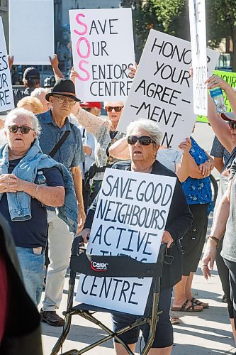 MIKE DEAL / FREE PRESS
A group of seniors rally outside City Hall chanting and waving signs to cars driving by on Main Street, to support Seniors Centres in Winnipeg and to draw attention to the fight for Good Neighbours Active Living Centre&#x2019;s building management rights Thursday morning.
Reporter: Nicole Buffie
240926 - Thursday, September 26, 2024.