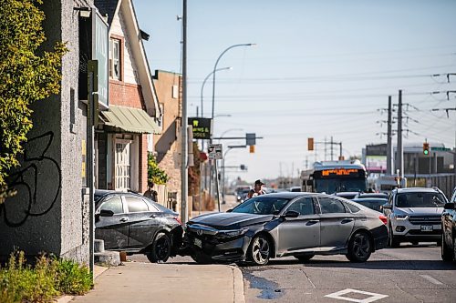 MIKAELA MACKENZIE / FREE PRESS
	
Two vehicles damaged in a collision outside of 420 Giggles at 713 McPhillips Street on Thursday, Sept. 26, 2024.

Winnipeg Free Press 2024