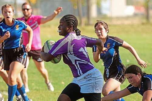 26092024
Anjolaoluwa Ajadi with the Vincent Massey Vikings JV runs the ball during rugby 7&#x2019;s action against the Souris Sabres at the Crocus 7&#x2019;s Jamboree at Crocus Plains Regional Secondary School on Thursday. 
(Tim Smith/The Brandon Sun) 