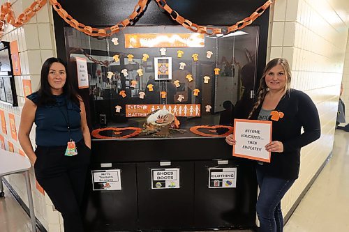 Betty Gibson School vice-principal Krista Adams (left) and Vaneesa Pascal stand by the "Every Child Matters" display on Thursday afternoon. (Photos by Abiola Odutola/The Brandon Sun)