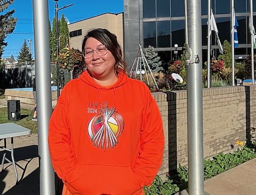 Natashia Marion, Indigenous community co-ordinator with Brandon Urban Aboriginal Peoples’ Council, moments after the Indigenous flag was raised at Brandon's City Hall Friday morning, to signal the start of Truth and Reconciliation Week in Westman. (Michele McDougall/The Brandon Sun)