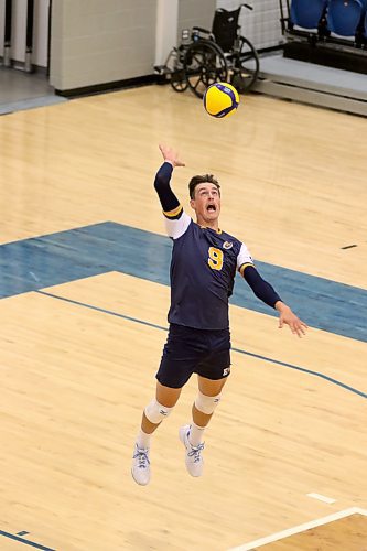 Brandon University Bobcats middle blocker Riley Brunet serves against the Waterloo Warriors during U Sports men's volleyball pre-season action at the Healthy Living Centre on Friday. (Thomas Friesen/The Brandon Sun)