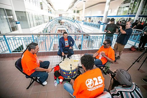 MIKAELA MACKENZIE / FREE PRESS
	
Premier Wab Kinew drums and sings with the Anishinaabe Voice Singers after a federal funding announcement at Portage Place on Friday, Sept. 27, 2024.

For Joyanne Story.
Winnipeg Free Press 2024