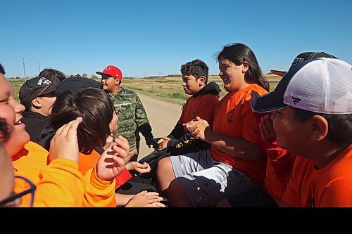 27092024
Students from Erickson Collegiate sing while taking a wagon ride during the Truth and Reconciliation Week 2024 event at Rolling River First Nation on Friday. 
(Tim Smith/The Brandon Sun)