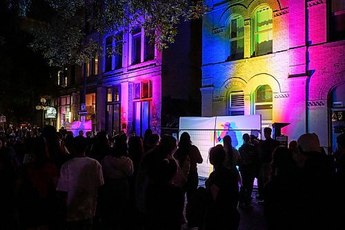 Mike Sudoma/Free Press
Ludochroma II is a returning exhibit which mixes lights, music and interpretive dance. Festival goers watch as musicians and dancer perform behind translucent white sheets resulting in music and colour shining through the streets of Albert St
Sept 28, 2024
