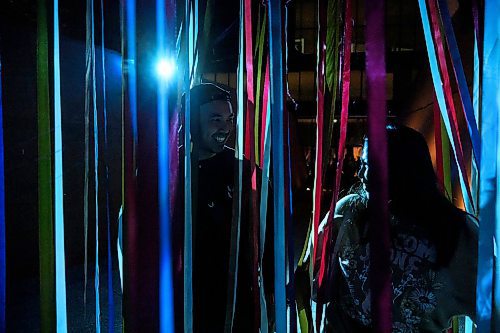 Mike Sudoma/Free Press
Festival Goers Gino (left) and Rina (right) go through the lit up streamers outside of the Canadian Museum for Human Rights Saturday night as part of Jaimie Issacs exhibit &#x201c;Nibi&#x201d;
Sept 28, 2024
