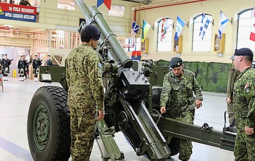 Reservist soldiers from the 38 Artillery Tactical Group conduct a demonstration of a C3 Howitzer weapon during the change of command ceremony, Sunday morning at the Brandon Armoury. (Michele McDougall/The Brandon Sun)  