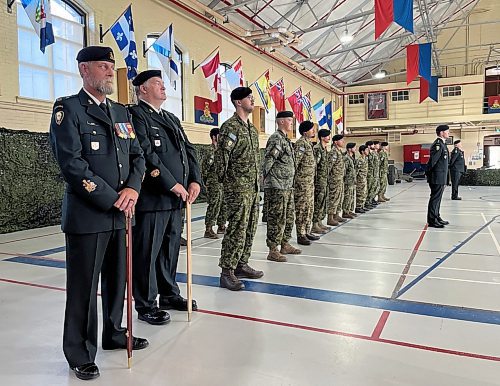 Reservist soldiers in the 38 Artillery Tactical Group stand at attention during the change of command ceremony Sunday morning at the Brandon Armoury. (Michele McDougall/The Brandon Sun)  