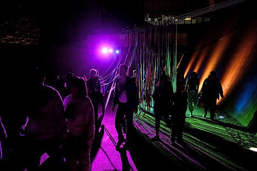 Mike Sudoma/Free Press
Festival Goers Gino walk through the lit up streamers outside of the Canadian Museum for Human Rights Saturday night as part of Jaimie Issacs exhibit &#x201c;Nibi&#x201d;
Sept 28, 2024
