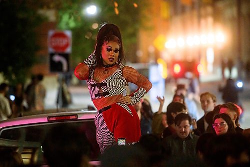 Mike Sudoma/Free Press
Drag performer Ruby Chopstix performs to a sizeable crowd infront of Darling Bar Saturday evening as part of Nuit Blanche
Sept 28, 2024
