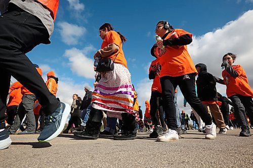 Participants make their way along Grand Valley Road to the former Brandon Residential School site during the Truth and Reconciliation Week 2024 Orange Shirt Day Walk on Monday. (Tim Smith/The Brandon Sun)