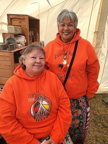 Knowledge keepers Debbie Huntinghawk (left) and Debbie Kuehne in one of the tents erected at the Riverbank Discovery Centre on Monday morning. (Abiola Odutola/The Brandon Sun)