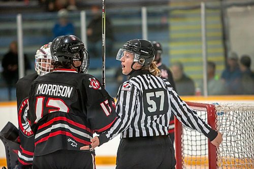 BROOK JONES / FREE PRESS
Ally Wareham (No. 57) is a female linesperson with Hockey Manitoba. She is pictured during first period action between the St. James Jr. Canucks and the visiting Charleswood Hawks in a Manitoba Major Junior Hockey League game at the Ab McDonald Arena in Winnipeg, Man., Friday, Sept. 27, 2024.