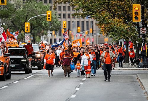 JOHN WOODS / FREE PRESS
People gather for Truth And Reconciliation Day or Orange Shirt Day in Manitoba as they walk down Portage Ave in Winnipeg Monday, September 30, 2024.  

Reporter: tyler