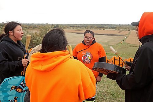 30092024
Drummers Iyana Spence Lori Carver, Brianna Hunt and Sam Jackson perform a song at the former Brandon Residential School site during the Truth and Reconciliation Week 2024 Orange Shirt Day Walk on Monday. Orange Shirt Day brings attention and education to the ongoing impacts of the Residential School system. (Tim Smith/The Brandon Sun)