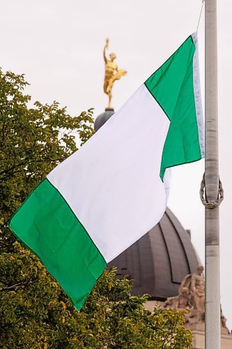 MIKE DEAL / FREE PRESS 
The Nigerian flag flys in Memorial Park as the Nigerian community celebrates Independence Day, which was granted in 1960 from Great Britain, Tuesday morning.
Reporter: 
241001 - Tuesday, October 01, 2024.